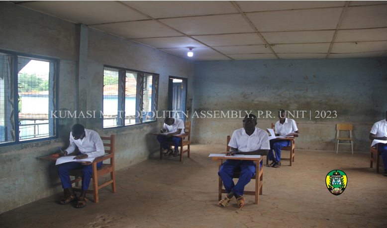 In-mates of the Kumasi Central Prisons writing the Social Studies Paper at the Armed Forces SHTS