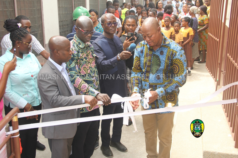 Hon. Samuel Pyne commissioning one of the institutional sanitation facilities.