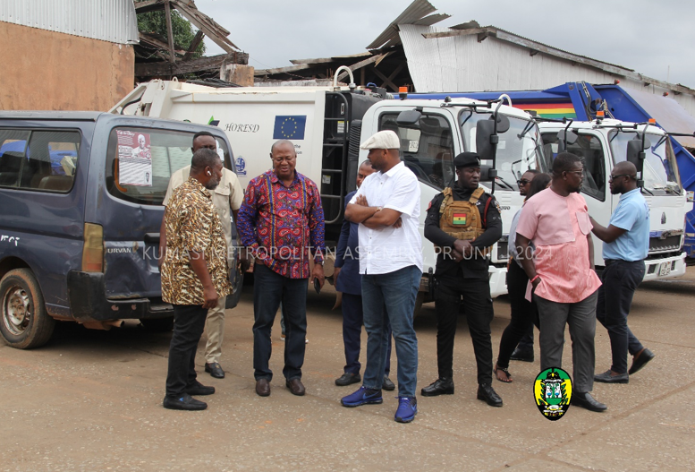 Hon. Assafuah being briefed by Hon. Pyne and staff of Waste Management of KMA